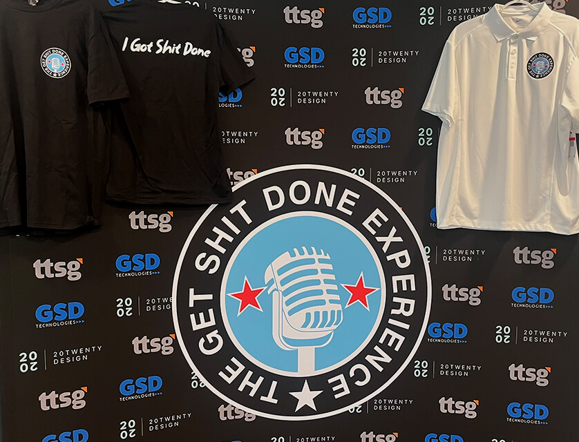 The Get Shit Done Experience podcast backdrop and shirts